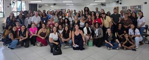 Assistente Social Protea com outros participantes do encontro de redes de Itaquera